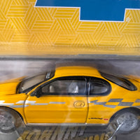 Johnny Lightning 2002 Chevy Monte Carlo Pace Car White Lightning CHASE with Collector Tin