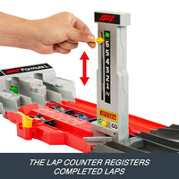 Hot Wheels Race Formula 1 Grand Prix Circuit Track Set with 3 1:64 Scale Die-Cast Toy Cars