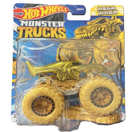 Hot Wheels Monster Trucks Mega Wrex toy truck in its original blister card packaging, featuring a metallic gold truck with oversized yellow wheels.